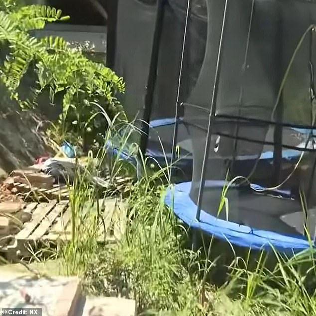 When officers arrived, they found the property strewn with rotting furniture, rusting trampolines, and piles of rubbish
