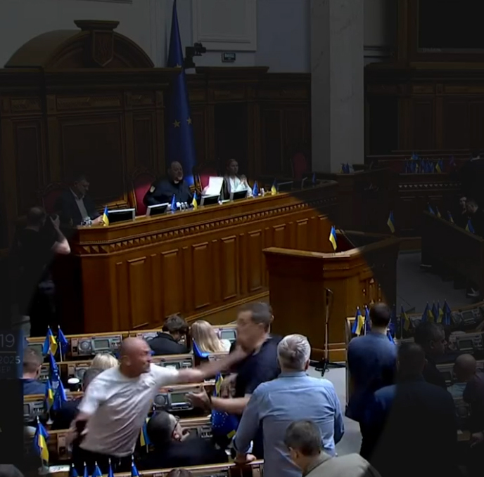 Brawl in Ukrainian parliament during anti-corruption bill vote.