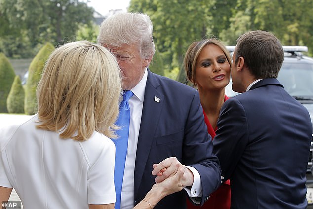The Trumps and Macrons greeted each other with kisses when they met in Paris in July 2017