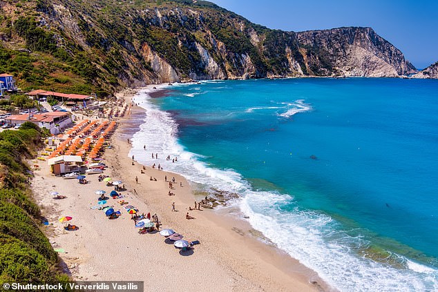 The 75-year-old was pulled from the sea unconscious after going for a swim on Ammoudi Beach