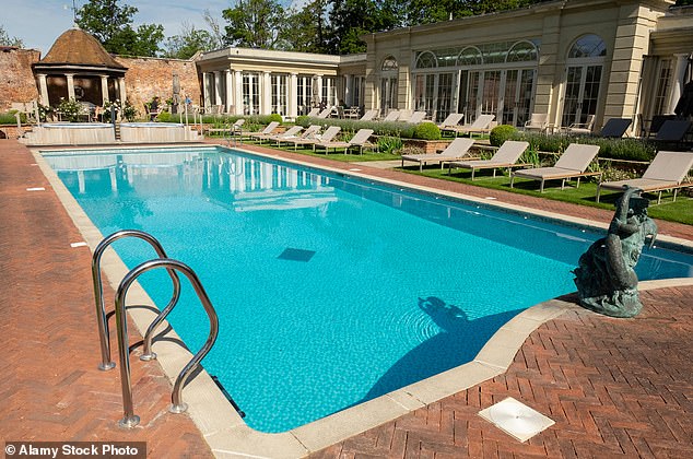 The outdoor swimming pool at Cliveden House, near Maidenhead, which delivers top-notch elegance