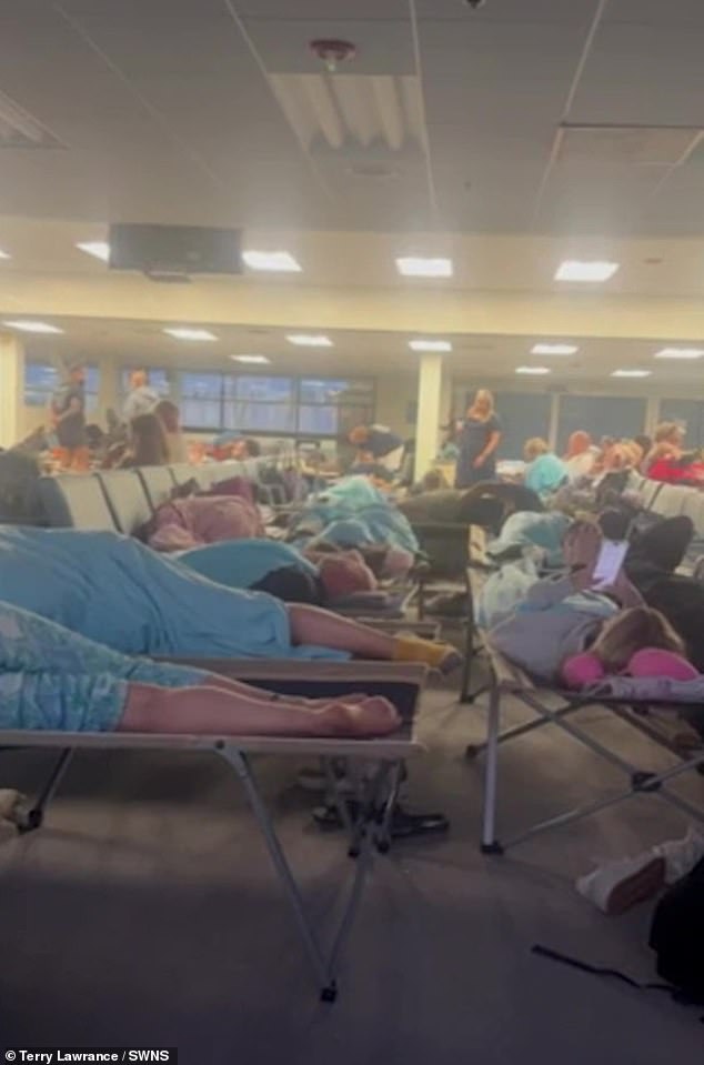 Rows of camp beds as passengers awaited updates on their flight in Bangor, Maine, U.S.
