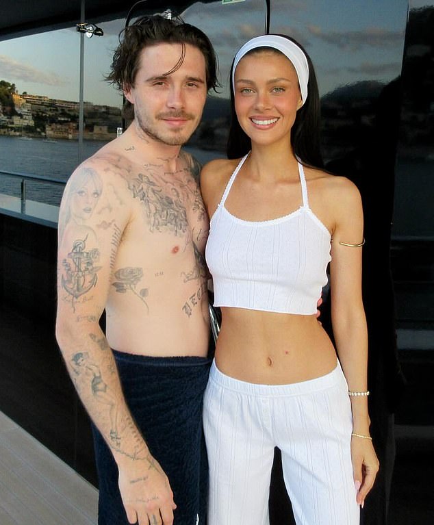 Brooklyn and Nicola on her family's yacht off the coast of France - where they are holidaying
