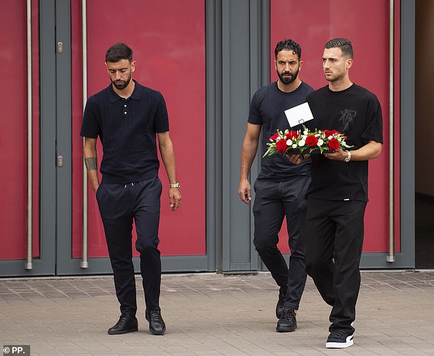 Bruno Fernandes, Ruben Amorim and Diogo Dalot laid flowers on behalf of Manchester United at the Anfield memorial for Diogo Jota and his brother Andre Silva