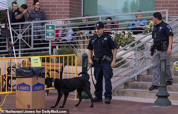 At 6.A.M. Idaho State Police with dogs do a sweep of trash cans, news media equipment and the cloud outside the Ada County Courthouse ahead of the July, 23rd, 2025 sentencing of killer Bryan Kohberger.