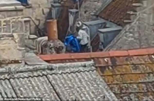 Police are looking for a man who was seen on roof space above The Corridor shopping centre, in Bath