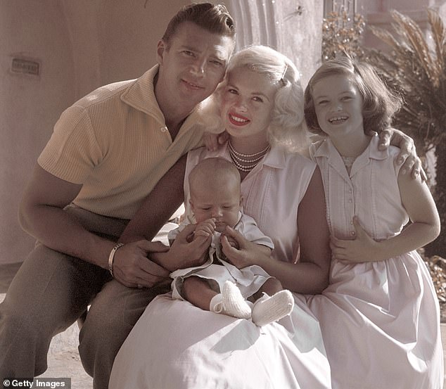 Jayne is pictured with her second husband Mickey Hargitay, her daughter Jayne Marie and her baby son Milkos in 1959, a few years before Mariska was born