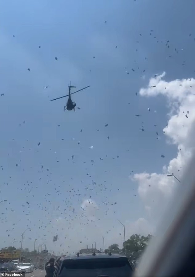Darrell 'Plant' Thomas, a beloved East Detroit car wash owner, was laid to rest on June 27 with a surreal final send-off, as a helicopter swooped over his former business and showered mourners with rose petals and bundles of cash