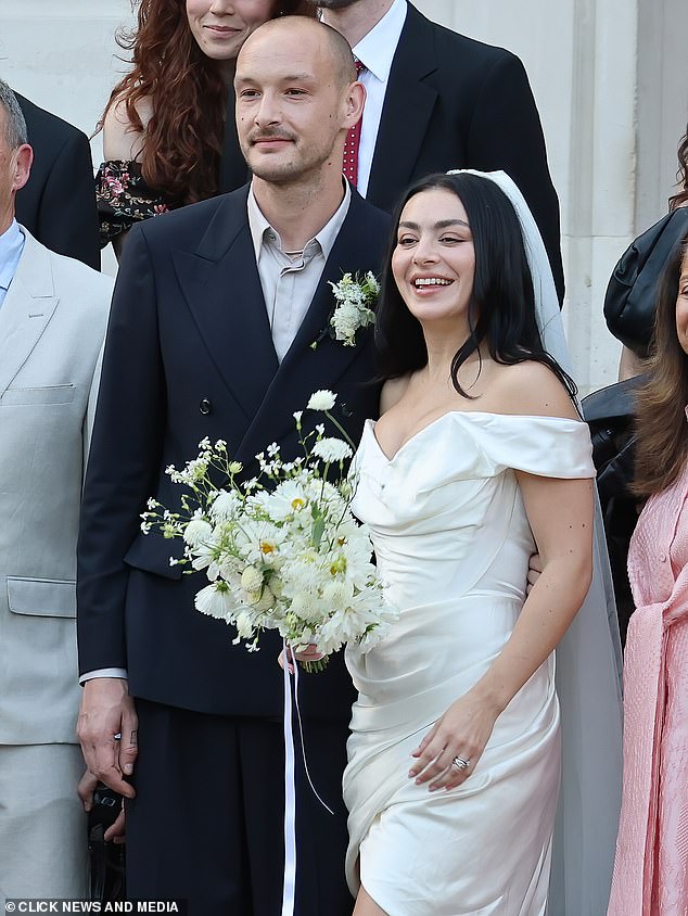 The Brat singer, 32, defied showbiz tradition and enjoyed a small ceremony without the spectacle, where she donned a white mini dress and her trademark shades