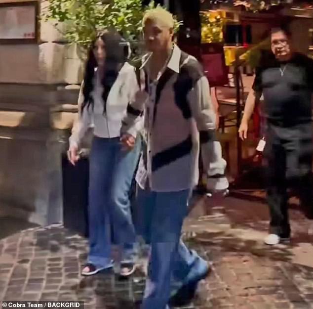 Cher, 79, and her boyfriend Alexander Edwards, 39, looked very much in love, holding hands as they exited the popular Jackie O nightclub in Rome on Sunday night