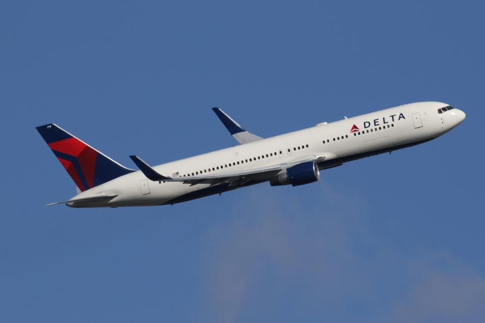 Delta 767 airplane in flight.