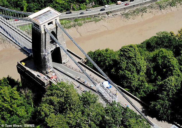 Parts of Mr Alfonso and Mr Longworth's bodies were discovered on the famous Clifton Suspension Bridge in Bristol, pictured, on July 10 last year. Pictured: Forensics at the scene