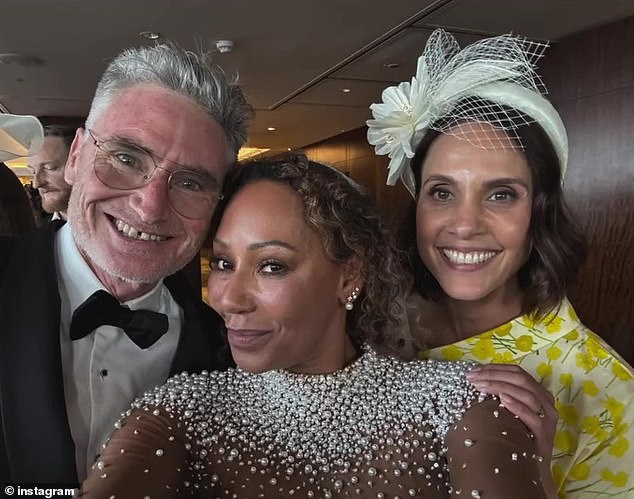 Dave Hughes has revealed what really went down inside Mel B's star-studded wedding. (Dave pictured left, with Mel B, centre, and wife Holly, right)