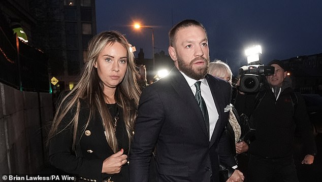 McGregor, pictured with his partner Dee Devlin at the High Court in Dublin in November 2024, faced an accusation that he 'brutally raped and battered' Nikita Hand (not pictured)