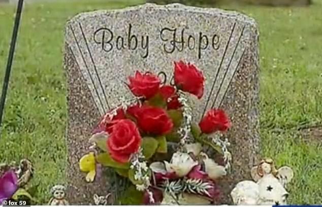 More than three decades after a baby was found dead inside a trash can in Indiana , the mother has finally been identified - and the father turned out not to be her husband (pictured: 'Baby Hope's' headstone)