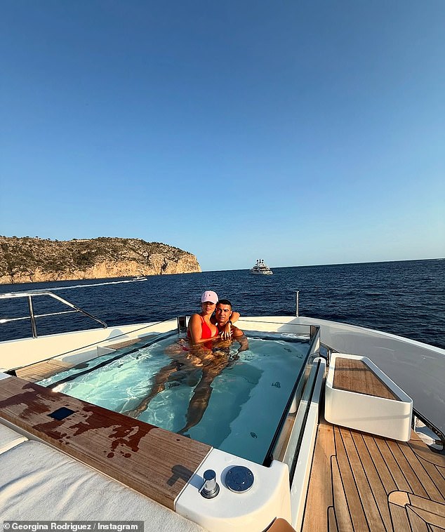 Cristiano Ronaldo 's girlfriend Georgina Rodriguez has shared a look at their lavish getaway in Mallorca after the footballer raised questions over his absence at Diogo Jota's funeral