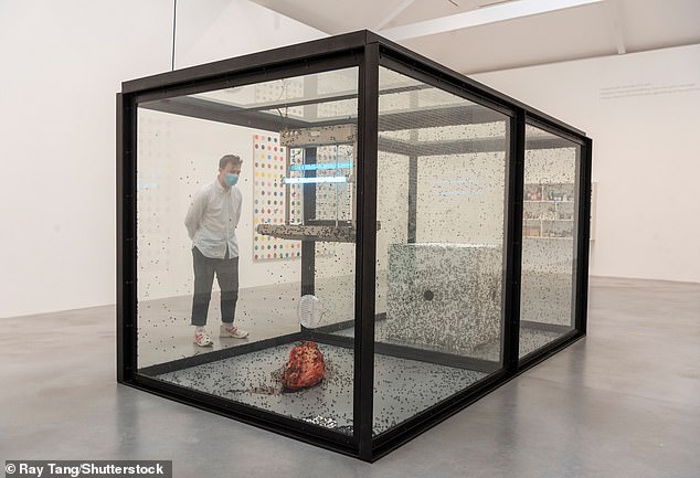 Damien Hirst's A Thousand Years, which showcases an army of flies feasting on a cow's head