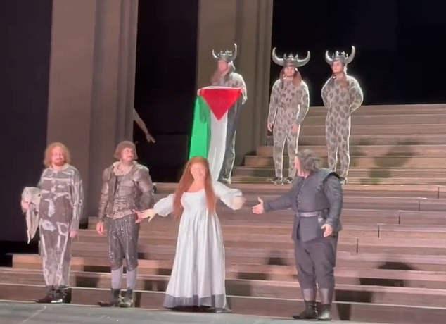 A dancer who unfurled a Palestinian flag during a performance at the Royal Opera House has been 'banished from working there again'