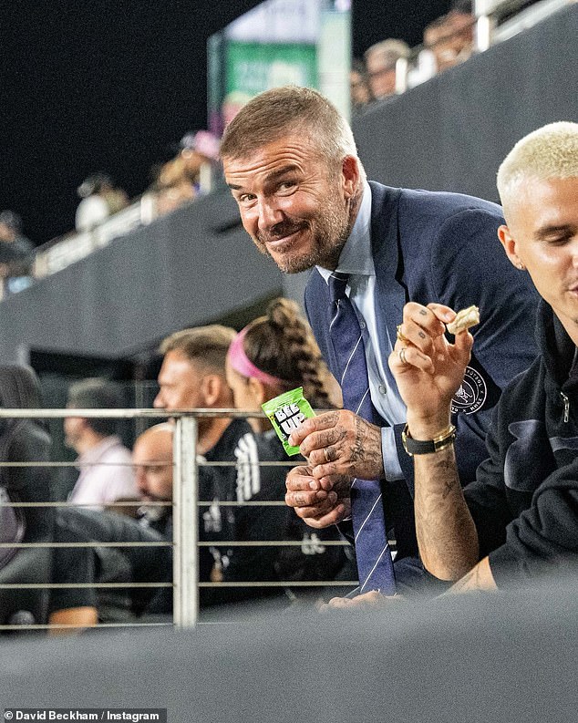 David Beckham was supported by his son Romeo as he promoted his snack brand over the weekend - while his eldest Brooklyn posted his own latest ad amid the continuing family feud
