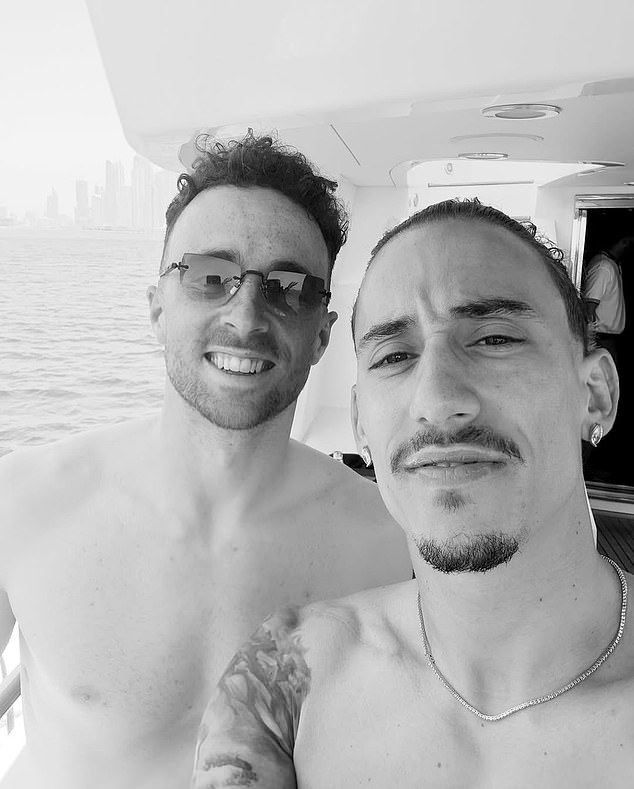 Kostas Tsimikas, right, has revealed a new tattoo in honour of his late team-mate Diogo Jota