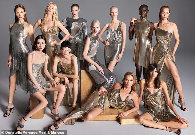 Gleaming: Models including Kate Moss, centre, and Claudia Schiffer, second from back left, in Versace¿s final collection