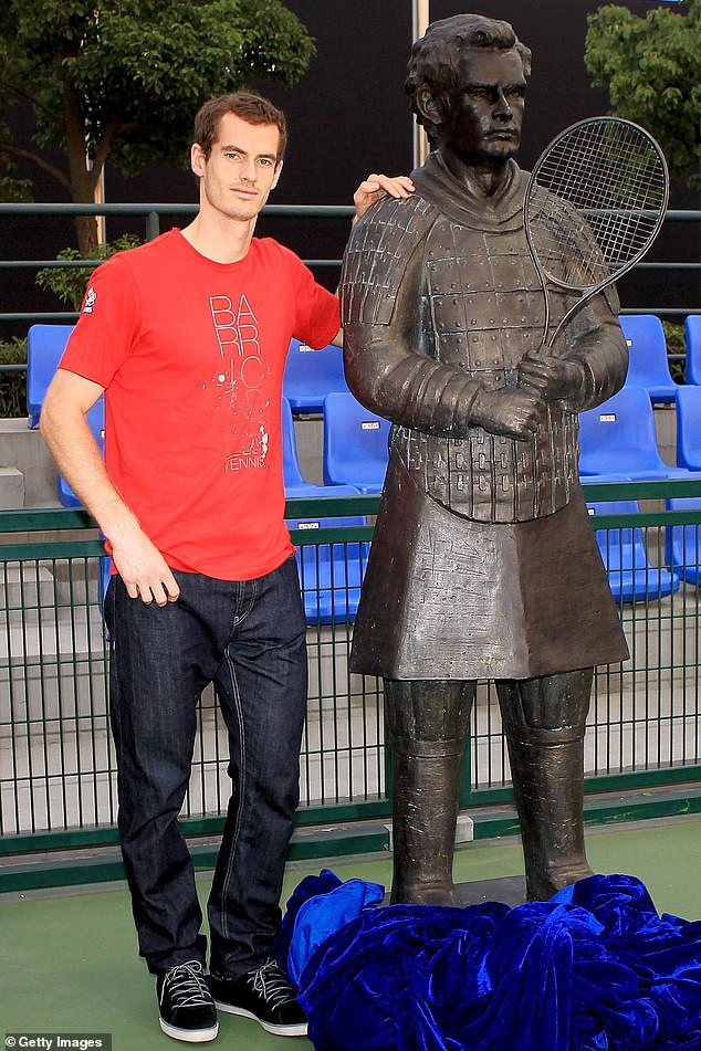 Sir Andy next to a very questionable 'terracotta warrior' version of himself in Shanghai, China