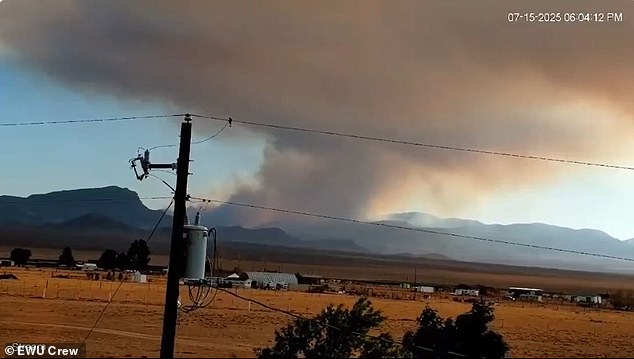 A livestream camera, set up on private land just outside the heavily guarded Groom Lake facility near Rachel, Nevada, captured eerie footage of smoke rising from deep within the classified base