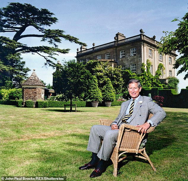 King Charles sitting on the lawn outside Highgrove, in Tetbury, Gloucestershire, in 2002