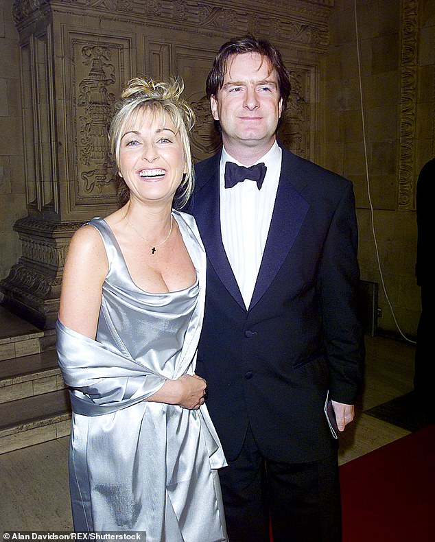 Glamorous: The couple attend the National Television Awards ceremony together in 1998