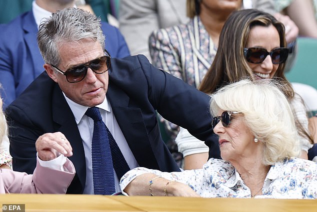The actor had been seen charming Queen Camilla as he took his seat at Centre Court on Wednesday