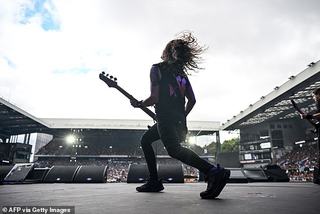 Anthrax's Frank Bello threw himself full force into their epic support performance as he rocked on stage