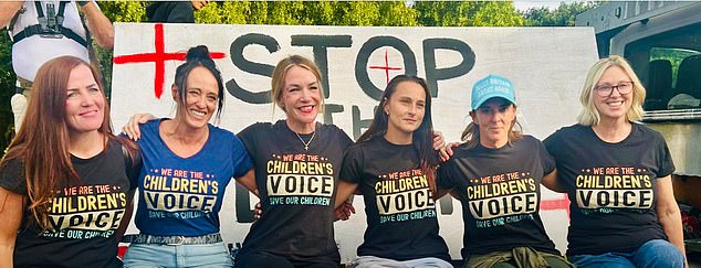 Nigel Farage's Reform candidate Orla Minihane (third from left) was pictured with women whose t-shirts read: 'We are the children's voice. Save our children'