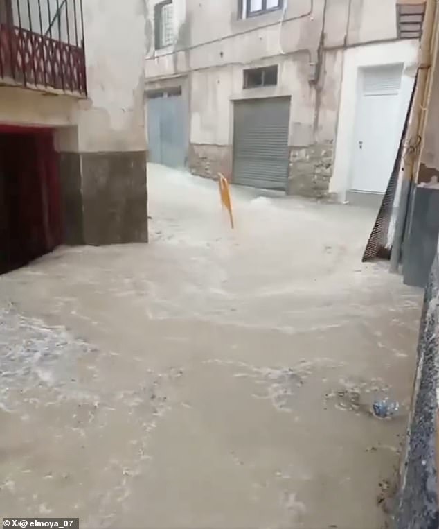 A series of freak storms have struck popular Spanish tourist hotspots turning roads into powerful rivers