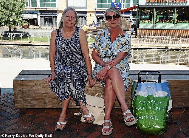 Furious residents in Reading, Berkshire, have criticised John Lewis's plans to build hundreds of new flats in their town, insisting they are 'already overwhelmed with plush new tower blocks and gridlocked streets' (Pictured: local residents Marion Walsh and Susan James)