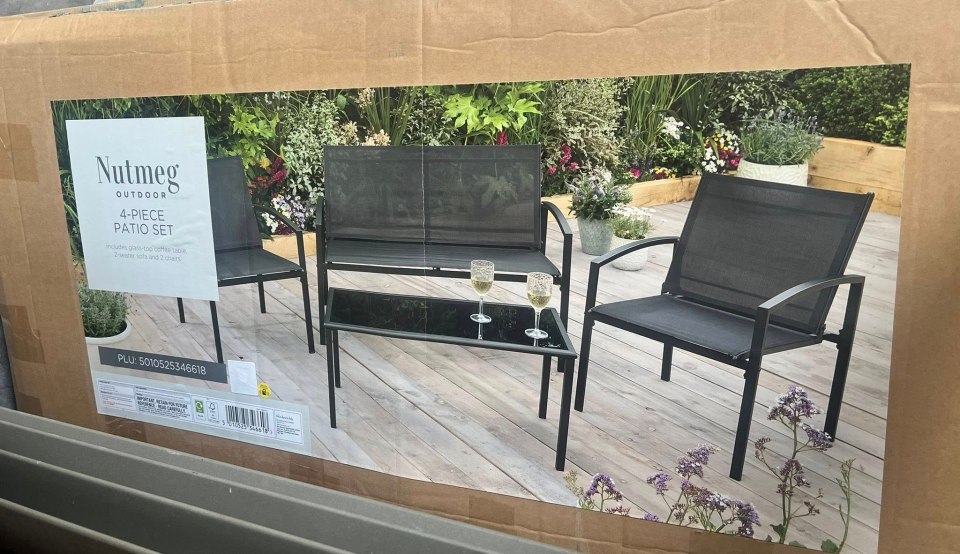 Box showing a four-piece patio set.