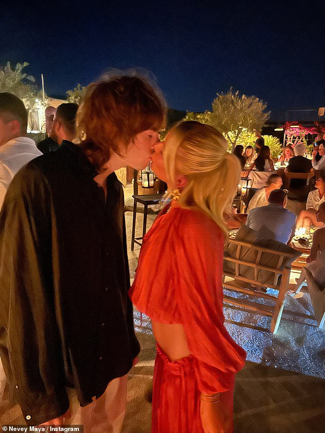 Liam Gallagher 's son Gene has made his new girlfriend the guest of honour on his dad's comeback tour