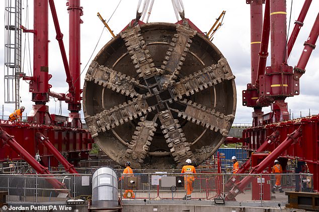 A giant tunnelling machine (pictured) has been lifted to the surface after finishing work on a HS2 tunnel - and no wonder the project is costing so much