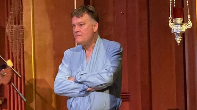 A barefooted Jonathan Baker, the Bishop of Fulham, took to the stage and grabbed a microphone to tell bemused performers and a 300-strong audience to leave