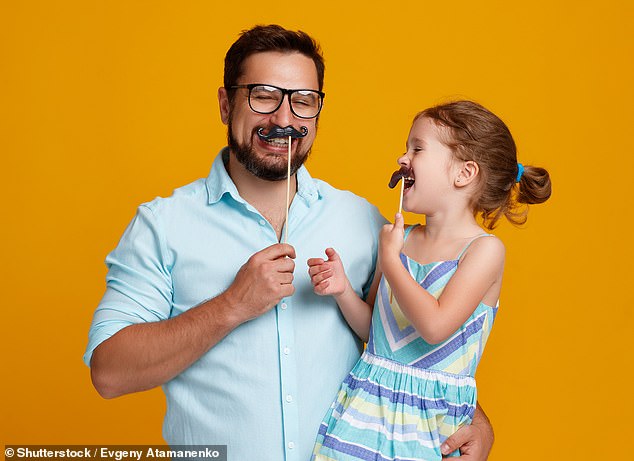 Dad jokes are important in helping children learn to be embarrassed by their parents, a researcher has previously argued (stock image)