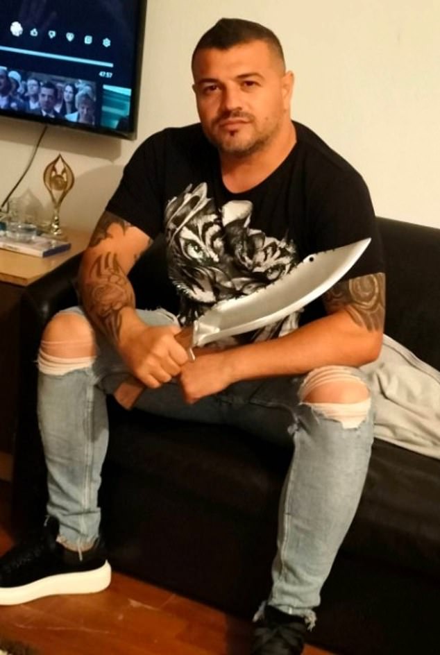 Aurel Mezei - a heavily tattooed 44-year-old from the northern Romanian city of Baia Mare, inherited Eileen Holland's home