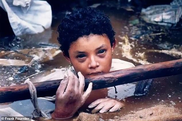This photograph taken by Frank Fournier of Omayra Sanchez was taken shortly before she died after becoming trapped in lahar following a volcanic eruption in Armero, Colombia in 1985. The image later became the World Press Photo of the Year on 1986