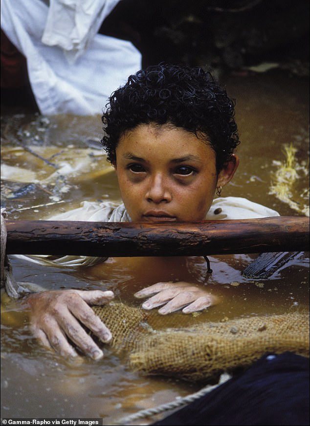 Omayra Sanchez died on November 16, 1985 after being trapped in volcanic mud for over 60 hours after a volcanic eruption struck the Colombian town of Armero. Omayra is pictured in this image on the day she died
