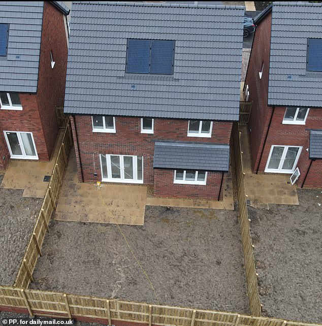 One young family has been left so furious they staged a very visible protest outside the show home on the estate to warn off prospective buyers