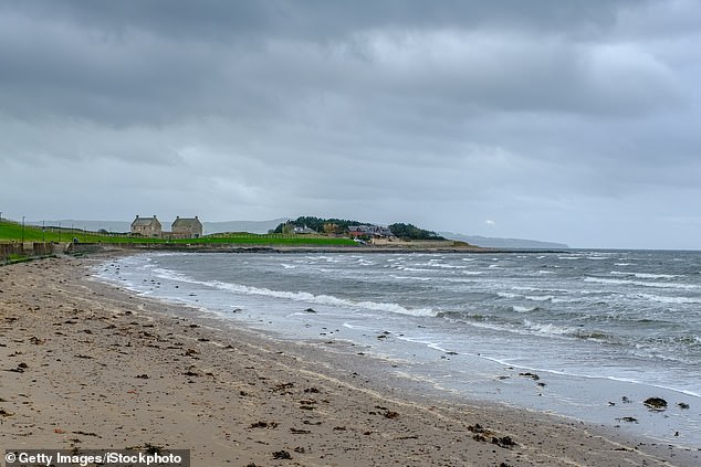 The leg was seen at Ayrshire beach in Scotland on the morning of June 10. Pictured: Prestwick Promenade looking south towards Ayr back into the town on a stormy day (file image)