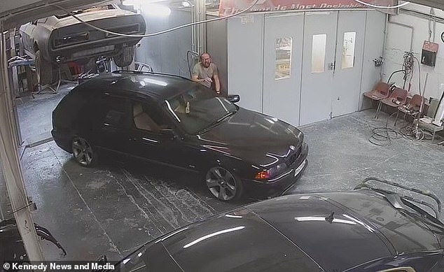 A garage owner revealed footage of the horrifying moment his manhood was crushed by an out-of-control car - leaving him unsure if his 'unrecognisable' penis still works