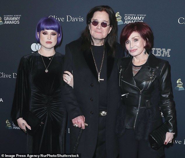Ozzy - pictured with daughter Kelly and wife Sharon in 2020 - had intended to return to Britain in 2023 before his health prevented him from leaving the US