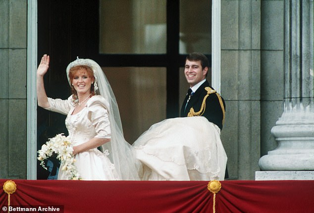 Around 100,000 people turned out to watch the happy couple kiss and wave from the balcony
