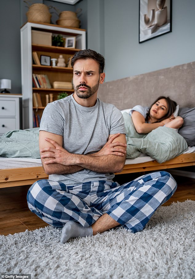 Your partner could be a secret sex addict, says Tracey Cox, and being emotionally distant is one of the key signs (stock image)