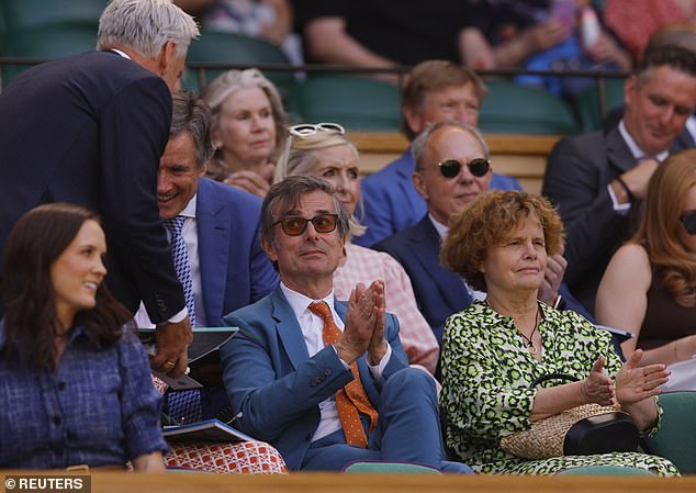 Vicky Flind (right in green), the estranged wife of paedophile Huw Edwards, has today been pictured in Wimbledon's royal box