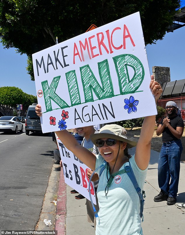 Hundreds of Angelenos gather to peacefully protest Immigrations and Customs Enforcement (ICE) tactics that are affecting their communities during a rally at Vermont and Sunset in the Los Feliz area of Los Angeles on July 4